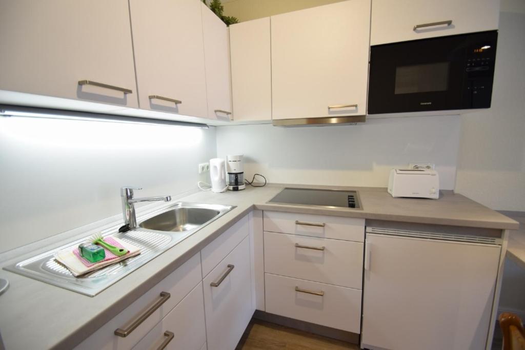 1-zimmer-appartement Mit Einbauschränken Und Doppelschrankbett Apartment Westerland